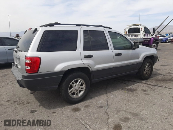 2004 Jeep Grand Cherokee Laredo with VIN 1J4GW48S34C339876, listed as a Copart auction lot 52428045 with 229,606 mi miles and Salvage Title. Bid and sale history available at carsss.com. Image 3.