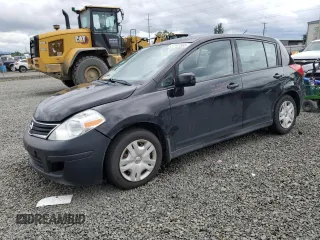 2011 Nissan Versa SL with VIN 3N1BC1CP0BL409588, listed as a Copart auction lot 57941885 with 134,913 mi miles and Salvage title. Bid and sale history available at DreamBid. Image 1.