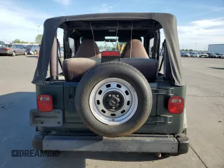 2002 Jeep Wrangler SE z VIN 1J4FA29P72P711802, wystawiony jako Copart lot #52640405 z przebiegiem 107 046 mil mil oraz Czysty tytuł • Clean title. Historia ofert i sprzedaży dostępna na DreamBid. Obrazek 6.