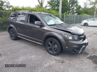 2020 Dodge Journey Crossroad with VIN 3C4PDCGB0LT270042, listed as a IAAI auction lot 40521806 with 102,934 mi miles and . Bid and sale history available at carsss.com. Image 1.