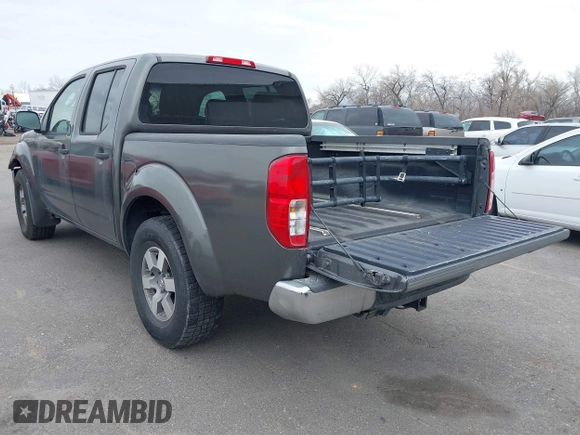 2008 Nissan Frontier SE with VIN 1N6AD07W58C405877, listed as a IAAI auction lot 41804611 with 81,859 mi miles and . Bid and sale history available at DreamBid. Image 3.