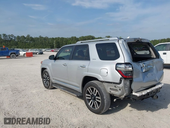 2014 Toyota 4Runner Limited with VIN JTEBU5JR9E5182133, listed as a IAAI auction lot 42081836 with 129,000 mi miles. Bid and sale history available at carsss.com. Image 3.