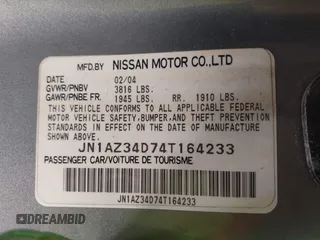 2004 Nissan 350Z Enthusiast z VIN JN1AZ34D74T164233, wystawiony jako IAAI lot #42509421 z przebiegiem 90 780 mil mil oraz . Historia ofert i sprzedaży dostępna na DreamBid. Obrazek 9.