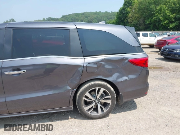 2022 Honda Odyssey Touring z VIN 5FNRL6H83NB023583, wystawiony jako IAAI lot #42425498 z przebiegiem Nie podano mil oraz . Historia ofert i sprzedaży dostępna na DreamBid. Obrazek 16.