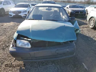 1996 Toyota Tercel DX z VIN JT2AC52L6T0170537, wystawiony jako Copart lot #42576525 z przebiegiem 66 926 mil mil oraz Szkoda całkowita • Salvage title. Historia ofert i sprzedaży dostępna na DreamBid. Obrazek 5.