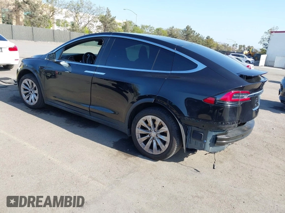 2017 Tesla Model X 90D with VIN 5YJXCBE25HF044617, listed as a IAAI auction lot 42096323 with 115,077 mi miles and . Bid and sale history available at DreamBid. Image 3.