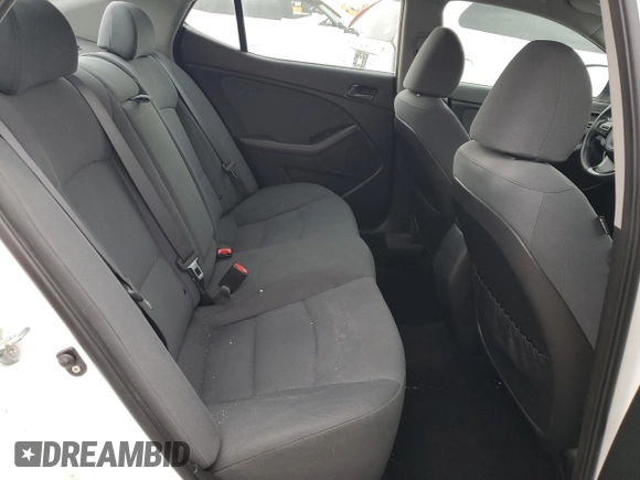 2015 Kia Optima LX z VIN KNAGM4A78F5645140, wystawiony jako Copart lot #53364945 z przebiegiem 91 649 mil mil oraz Szkoda całkowita • Salvage title. Historia ofert i sprzedaży dostępna na DreamBid. Obrazek 10.