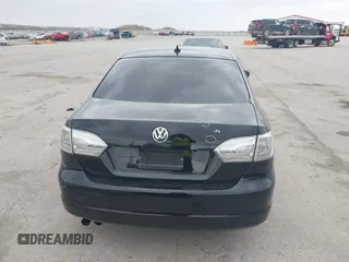 2014 Volkswagen Jetta SE z VIN 3VWD17AJ7EM388375, wystawiony jako IAAI lot #42144779 z przebiegiem 104 801 mil mil oraz . Historia ofert i sprzedaży dostępna na DreamBid. Obrazek 12.