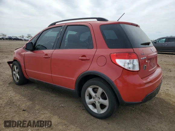 2009 Suzuki SX4 AWD z VIN JS2YB413895101144, wystawiony jako Copart lot #54895655 z przebiegiem 81 261 mil mil oraz Szkoda całkowita • Salvage title. Historia ofert i sprzedaży dostępna na DreamBid. Obrazek 2.