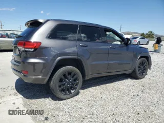 2018 Jeep Grand Cherokee Altitude with VIN 1C4RJFAG5JC320742, listed as a Copart auction lot 56988195 with 140,320 mi miles and Salvage title. Bid and sale history available at DreamBid. Image 3.