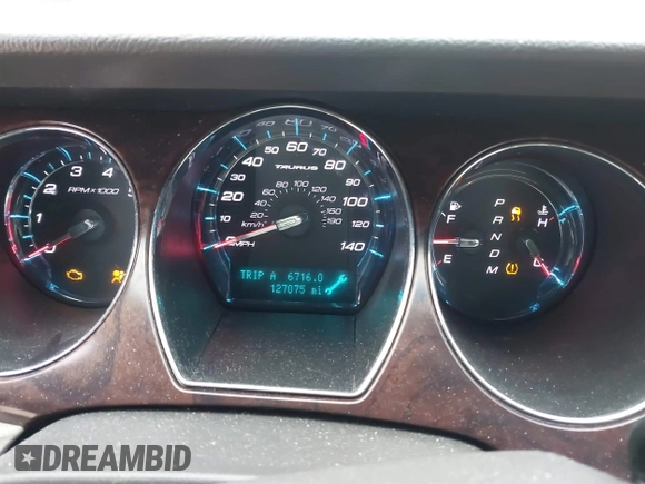 2011 Ford Taurus SEL with VIN 1FAHP2EW5BG133814, listed as a IAAI auction lot 41608224 with 127,075 mi miles. Bid and sale history available at carsss.com. Image 15.