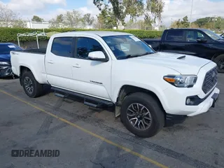2020 Toyota Tacoma SR5 with VIN 3TMBZ5DN7LM026596, listed as a IAAI auction lot 40705410 with 123,489 mi miles and . Bid and sale history available at DreamBid. Image 1.