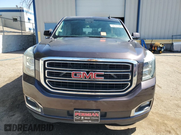 2015 GMC Yukon SLT z VIN 1GKS1BKC5FR689549, wystawiony jako Copart lot #56747385 z przebiegiem 102 856 mil mil oraz Szkoda całkowita • Salvage title. Historia ofert i sprzedaży dostępna na DreamBid. Obrazek 5.