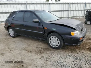1998 Subaru Impreza L with VIN JF1GF4354WG805257, listed as a Copart auction lot 73696134 with 141,441 mi miles and Salvage title. Bid and sale history available at DreamBid. Image 4.