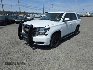 2018 Chevrolet Tahoe Commercial z VIN 1GNSKDEC0JR365649, wystawiony jako Copart lot #55087645 z przebiegiem Nie podano mil oraz Czysty tytuł • Clean title. Historia ofert i sprzedaży dostępna na DreamBid. Obrazek 1.