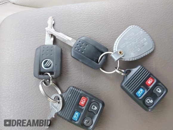 2004 Mercury Mountaineer Convenience z VIN 4M2ZU86K34ZJ16775, wystawiony jako IAAI lot #42216956 z przebiegiem 89 010 mil mil oraz . Historia ofert i sprzedaży dostępna na DreamBid. Obrazek 11.
