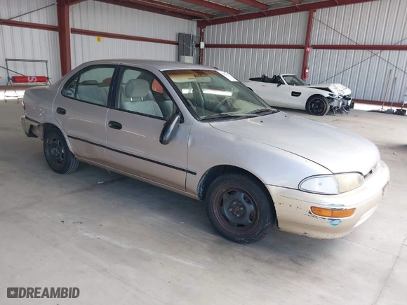 1996 Geo Prizm with VIN 1Y1SK5267TZ059737, listed as a IAAI auction lot 41874742 with NaN miles. Bid and sale history available at carsss.com. Image 1.