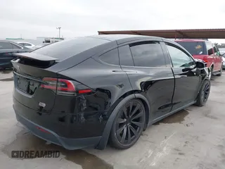 2023 Tesla Model X Plaid with VIN 7SAXCBE63PF376320, listed as a IAAI auction lot 40954738 with Not Provided miles and . Bid and sale history available at DreamBid. Image 4.