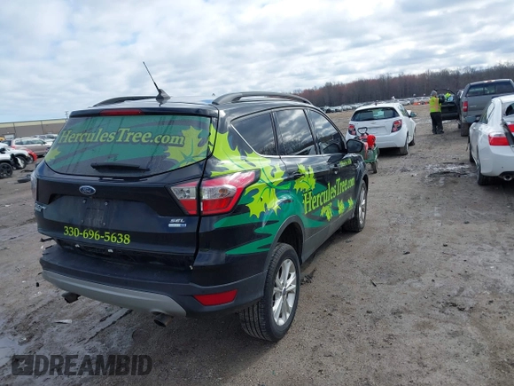2018 Ford Escape SEL with VIN 1FMCU9HD2JUD30385, listed as a IAAI auction lot 41919203 with 160,868 mi miles. Bid and sale history available at carsss.com. Image 4.