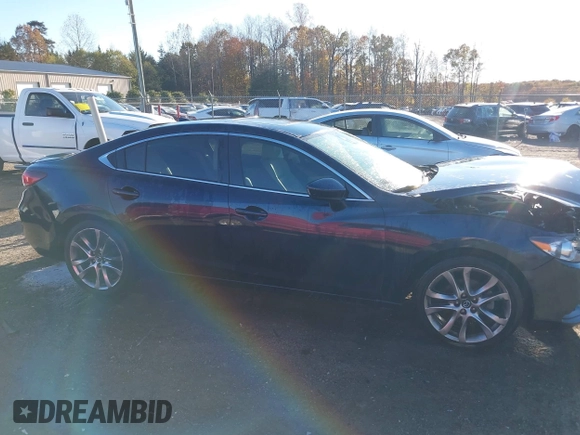 2015 Mazda 6 i Grand Touring with VIN JM1GJ1W55F1183824, listed as a IAAI auction lot 40840126 with 132,773 mi miles. Bid and sale history available at carsss.com. Image 14.