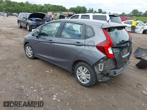 2015 Honda Fit LX z VIN 3HGGK5H59FM714352, wystawiony jako IAAI lot #42156097 z przebiegiem 103 587 mil mil oraz . Historia ofert i sprzedaży dostępna na DreamBid. Obrazek 3.