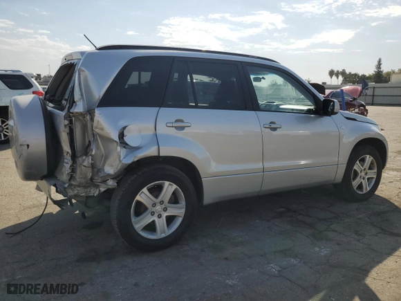 2006 Suzuki Grand Vitara Luxury with VIN JS3TD947X64105371, listed as a Copart auction lot 74854714 with 105,797 mi miles and Salvage Title. Bid and sale history available at carsss.com. Image 3.