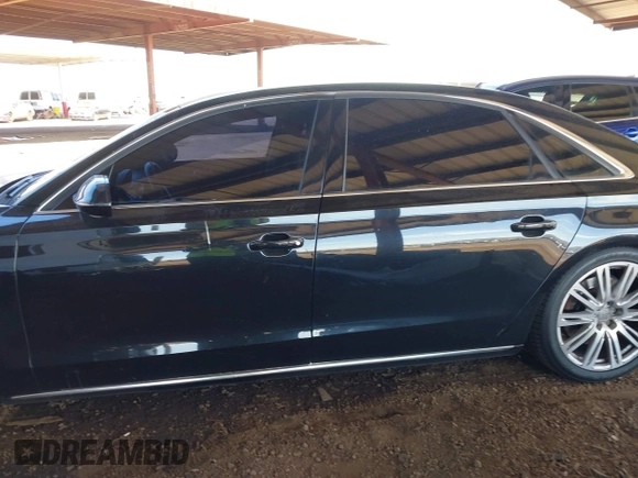 2011 Audi A8 with VIN WAURVAFD1BN027915, listed as a IAAI auction lot 41635275 with 95,143 mi miles and . Bid and sale history available at DreamBid. Image 15.