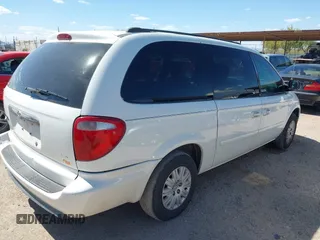 2005 Chrysler Town & Country LX with VIN 2C4GP44R75R213048, listed as a IAAI auction lot 42068985 with 100,688 mi miles and . Bid and sale history available at DreamBid. Image 4.