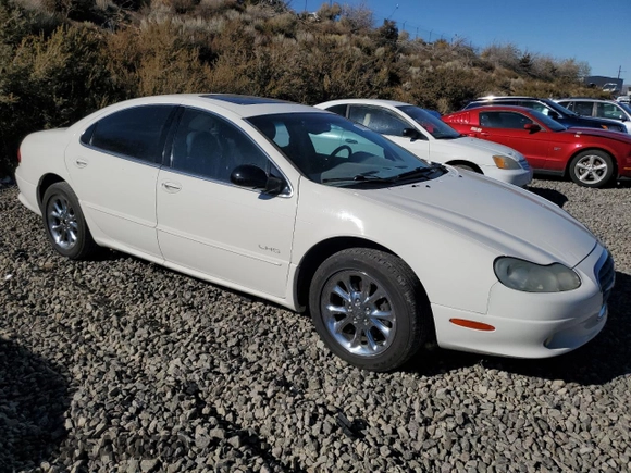 2001 Chrysler LHS z VIN 2C3AC56GX1H547856, wystawiony jako Copart lot #77842124 z przebiegiem 97 378 mil mil oraz Tytuł czysty. Historia ofert i sprzedaży dostępna na DreamBid. Obrazek 4.