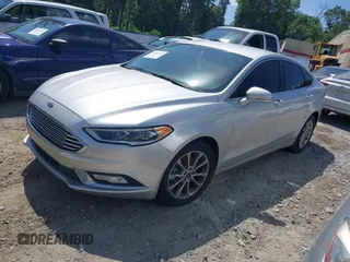 2017 Ford Fusion SE z VIN 3FA6P0HDXHR238713, wystawiony jako IAAI lot #42304140 z przebiegiem 157 630 mil mil oraz . Historia ofert i sprzedaży dostępna na DreamBid. Obrazek 2.
