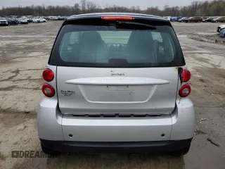 2008 Smart fortwo Pure z VIN WMEEJ31X58K178519, wystawiony jako Copart lot #52978925 z przebiegiem 50 975 mil mil oraz Szkody całkowita. Historia ofert i sprzedaży dostępna na DreamBid. Obrazek 6.