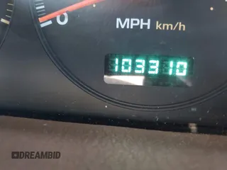 2000 Jeep Grand Cherokee Laredo z VIN 1J4G258S5YC237373, wystawiony jako IAAI lot #42736569 z przebiegiem 103 310 mil mil oraz . Historia ofert i sprzedaży dostępna na DreamBid. Obrazek 7.
