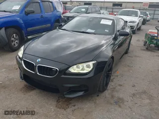 2013 BMW M6 with VIN WBSLX9C50DC968777, listed as a IAAI auction lot 41966918 with 113,458 mi miles. Bid and sale history available at carsss.com. Image 2.