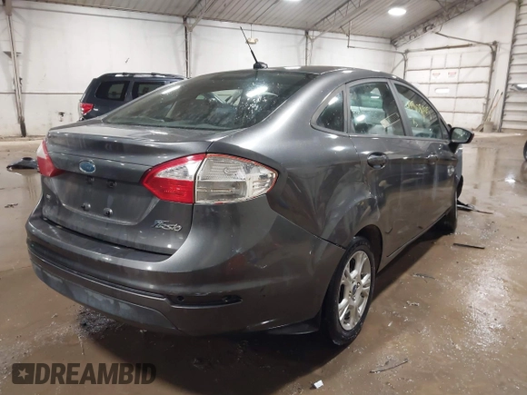 2015 Ford Fiesta SE with VIN 3FADP4BJ9FM164093, listed as a IAAI auction lot 41308905 with 75,839 mi miles. Bid and sale history available at carsss.com. Image 4.