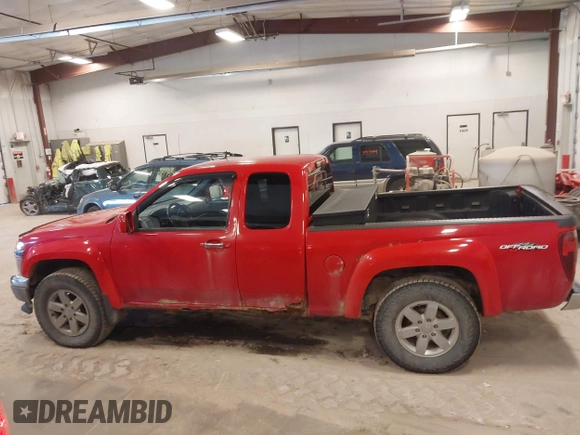 2011 GMC Canyon z VIN 1GTJ6NFE1B8109333, wystawiony jako IAAI lot #42035352 z przebiegiem 135 403 mil mil oraz . Historia ofert i sprzedaży dostępna na DreamBid. Obrazek 14.