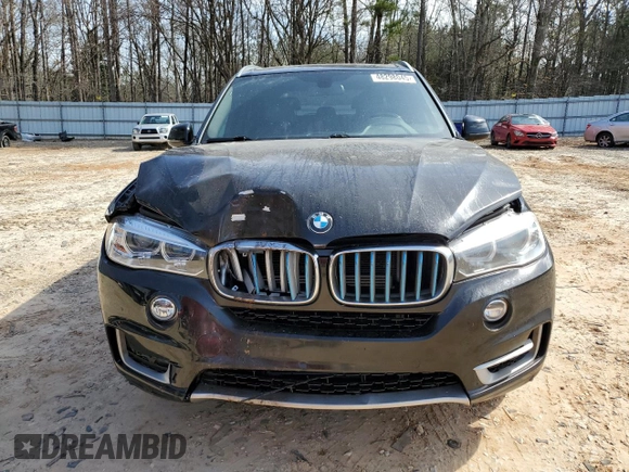 2018 BMW X5 xDrive40e iPerformance with VIN 5UXKT0C52J0V99605, listed as a Copart auction lot 48298045 with 97,339 mi miles and Salvage Title. Bid and sale history available at carsss.com. Image 5.