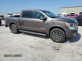 2017 Nissan Titan SV z VIN 1N6AA1E54HN512447, wystawiony jako Copart lot #56543875 z przebiegiem 119 426 mil mil oraz Czysty tytuł • Clean title. Historia ofert i sprzedaży dostępna na DreamBid. Obrazek 4.