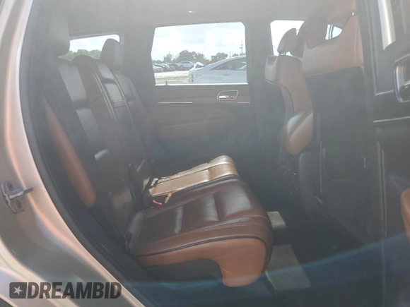 2011 Jeep Grand Cherokee Overland with VIN 1J4RS6GG4BC710103, listed as a Copart auction lot 51316235 with 179,393 mi miles and Salvage Title. Bid and sale history available at DreamBid. Image 11.