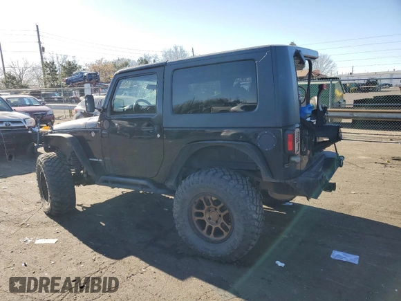 2009 Jeep Wrangler Rubicon with VIN 1J4GA64169L765933, listed as a Copart auction lot 84963104 with 107,190 mi miles and Salvage Title. Bid and sale history available at DreamBid. Image 2.