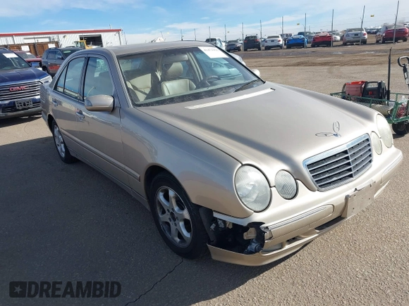2002 Mercedes-Benz E-Class with VIN WDBJF65J92B479841, listed as a IAAI auction lot 41471955 with 203,527 mi miles. Bid and sale history available at carsss.com. Image 1.