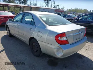2004 Toyota Camry LE with VIN 4T1BE32K74U350908, listed as a IAAI auction lot 42099989 with 120,971 mi miles. Bid and sale history available at carsss.com. Image 3.