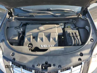 2016 Cadillac SRX Luxury Collection z VIN 3GYFNBE32GS551599, wystawiony jako Copart lot #56369345 z przebiegiem 90 190 mil mil oraz Szkoda całkowita • Salvage title. Historia ofert i sprzedaży dostępna na DreamBid. Obrazek 12.