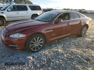 2012 Jaguar XJ with VIN SAJWA1CB3CLV37685, listed as a Copart auction lot 87586005 with 59,885 mi miles and Salvage Title. Bid and sale history available at DreamBid. Image 1.