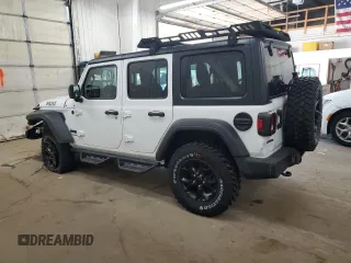2022 Jeep Wrangler Unlimited Willys with VIN 1C4HJXDM0NW244953, listed as a Copart auction lot 71495154 with 14,577 mi miles and Salvage Title. Bid and sale history available at DreamBid. Image 2.