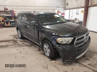 2013 Dodge Durango Crew with VIN 1C4RDJDG7DC661411, listed as a IAAI auction lot 41617514 with 145,309 mi miles and . Bid and sale history available at DreamBid. Image 1.