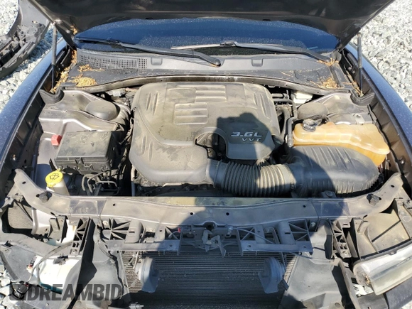 2014 Dodge Charger SXT z VIN 2C3CDXHG1EH315764, wystawiony jako Copart lot #57605135 z przebiegiem 273 912 mil mil oraz Szkoda całkowita • Salvage title. Historia ofert i sprzedaży dostępna na DreamBid. Obrazek 11.
