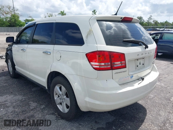 2013 Dodge Journey Canada Value z VIN 3C4PDCAB1DT646810, wystawiony jako IAAI lot #42484918 z przebiegiem 212 456 mil mil oraz . Historia ofert i sprzedaży dostępna na DreamBid. Obrazek 3.