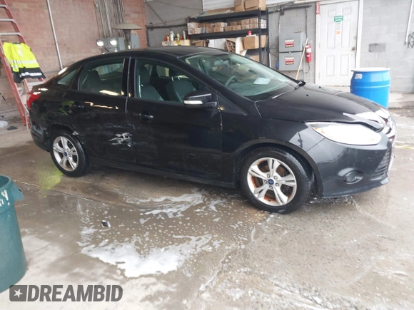 2013 Ford Focus SE with VIN 1FADP3F21DL333194, listed as a IAAI auction lot 42071641 with 107,912 mi miles. Bid and sale history available at carsss.com. Image 1.