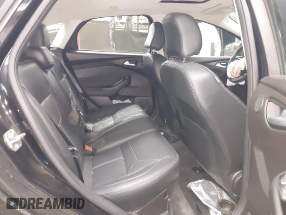 2017 Ford Focus Titanium with VIN 1FADP3N24HL272396, listed as a IAAI auction lot 41852208 with 92,945 mi miles and . Bid and sale history available at carsss.com. Image 8.
