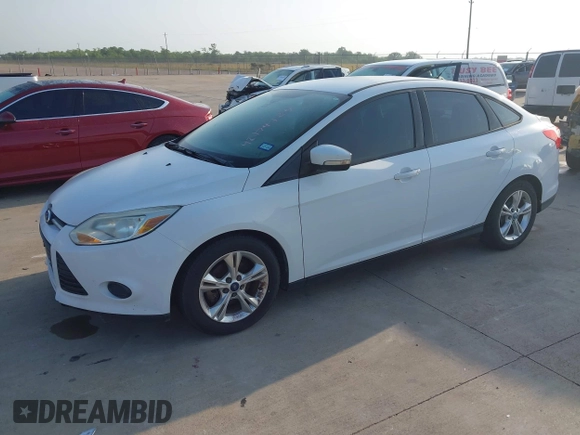 2014 Ford Focus SE with VIN 1FADP3F26EL163285, listed as a IAAI auction lot 42174124 with 172,016 mi miles and . Bid and sale history available at carsss.com. Image 2.